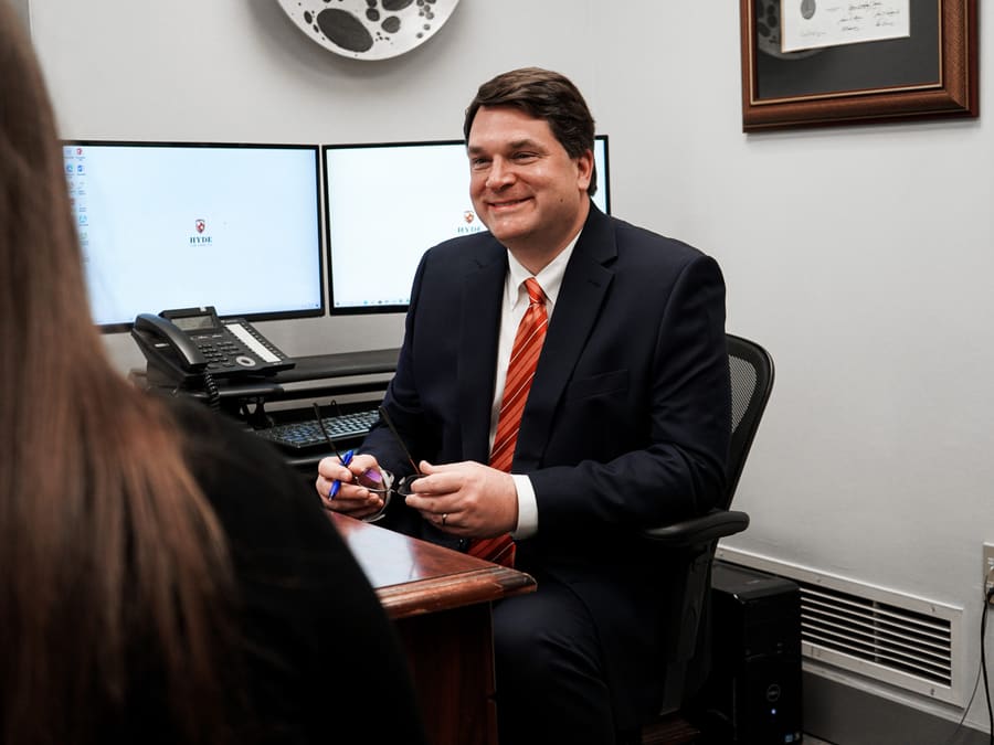 Max T. Hyde, Jr. at his desk in the Hyde Law Firm office, Spartanburg, SC