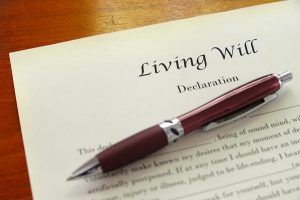 Living Will declaration document with a pen resting on it